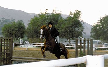 Catherine Monson participating in her first horse show in 1989.